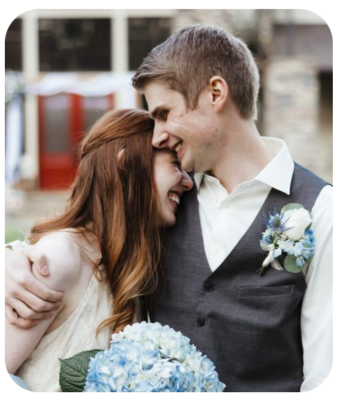 Michael James embraces his wife on their wedding day.